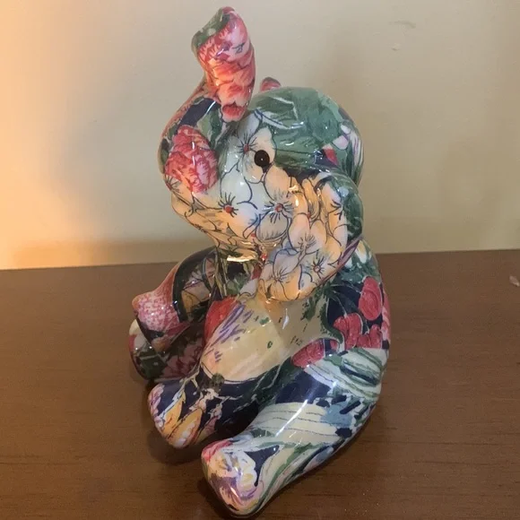 Floral sitting up elephant trunk up porcelain figurine - Picture 3 of 7